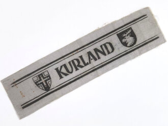 Ärmelband " Kurland " gedruckte Ausführung, rückseitig mit Stempel " Erich Märker, Gallenberg "( nach Auskunft des Vorbesitzers war dies der beliehene)  Länge 23 cm