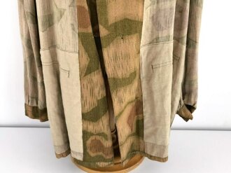 Sumpftarn Hose und Jacke Wehrmacht. Dünnes Material wie für die Helmbezüge verwendet wurde. Mir so nicht bekannt. Sehr guter Gesamtzustand, lediglich die Meatllschliesse der Hose hat Rostflecken hinterlassen