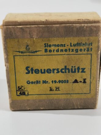 Luftwaffe Steuerschütz , Gerät Nr. 19-9005, in der originalen Umverpackung, Funktion nicht geprüft