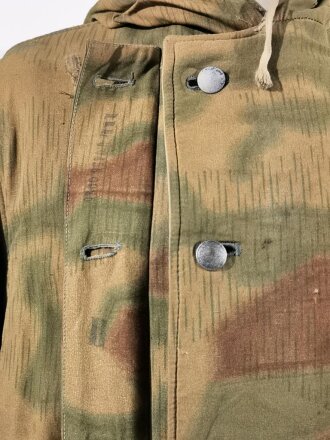 Winterwendejacke Wehrmacht, sumpftarn auf weiß. Getragenes Stück, Farbfrisch mit diversen Fehlstellen