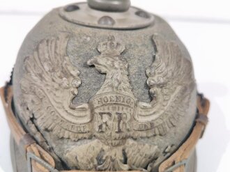 Preussen 1.Weltkrieg, feldgraue Pickelhaube für Mannschaften der Artillerie aus Filz. Kammerstück in gutem Gesamtzustand, bei dem Kinnriemen handelt es sich um eine neuzeitliche Reproduktion