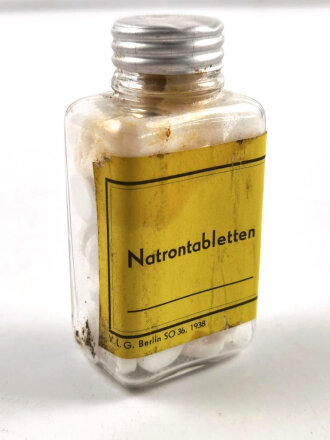 Fläschchen "Natrontabletten " ,  gehört so unser anderem in Verbandkästen des Luftschutz