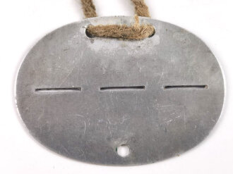 Erkennungsmarke Wehrmacht aus Aluminium eines Angehörigen " 4.Kp.E.Batl.213 " 4. Kompanie. Ersatz. Bataillon 213