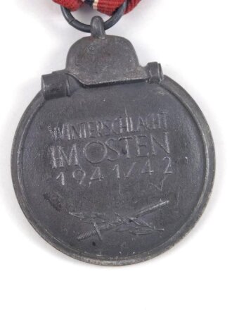 Medaille " Winterschlacht im Osten" mit Hersteller 25 im Bandring für Arbeitsgemeinschaft der Graveur-, Gold- und Silberschmiedeinnungen, Hanau a. Main, am Band