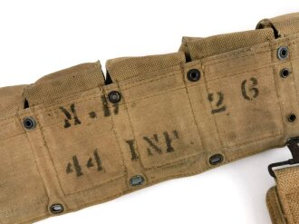 U.S. WWI, Model 1917  enlisted medical belt with unusual pouch attached. Buckle damaged with old " repair" hard to find