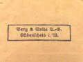 Kriegsverdienstkreuz 2. Klasse 1939 mit Schwertern, im Bandring Hersteller " 40" Berg & Nolte, Lüdenscheid (B&NL)  mit passender Verleihungstüte diese Rückseitig gestempelt