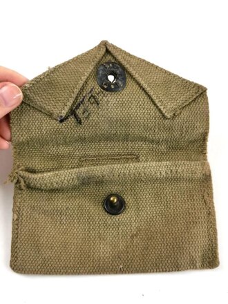 U.S. WWII Bandage pouch. Khaki, dated 1943, used