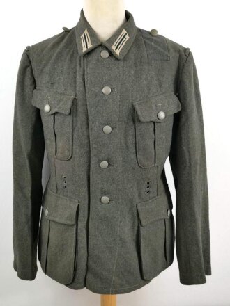 Heer, Feldbluse für Mannschaften Modell 1940. Kammerstück in gutem Zustand, eine alte Flickstelle auf der Schulter. Die Jragenspiegel original vernäht, ungereinigtes Stück