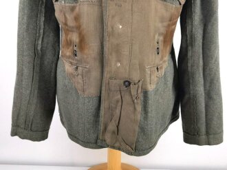 Heer, Feldbluse für Mannschaften Modell 1940. Kammerstück in gutem Zustand, eine alte Flickstelle auf der Schulter. Die Jragenspiegel original vernäht, ungereinigtes Stück