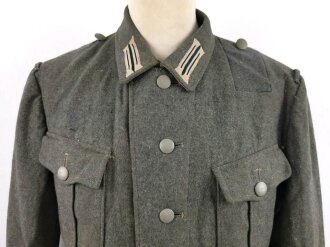 Heer, Feldbluse für Mannschaften Modell 1940. Kammerstück in gutem Zustand, eine alte Flickstelle auf der Schulter. Die Jragenspiegel original vernäht, ungereinigtes Stück