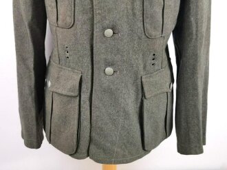 Heer, Feldbluse für Mannschaften Modell 1940. Kammerstück in gutem Zustand, eine alte Flickstelle auf der Schulter. Die Jragenspiegel original vernäht, ungereinigtes Stück