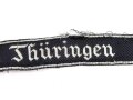 Ärmelband für Führer der SS - Standarte Thüringen. Metallfaden, von der Uniform abgetrenntes Stück  mit RZM Etikett. Länge 37cm