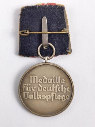 Medaille Deutsche Volkspflege an Einzelspange, Buntmetall