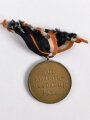 Kriegsverdienstmedaille 1939 am kurzen orangenen Band