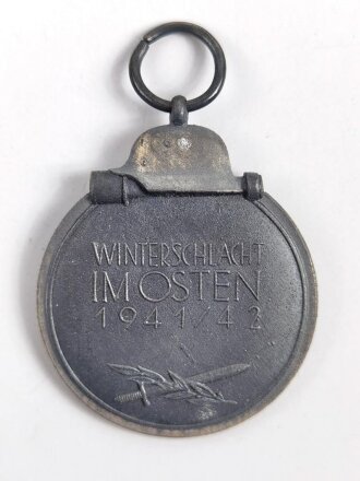 Medaille " Winterschlacht im Osten " mit Verleihungstüte, Hersteller 93 im Bandring für " Richard Simm & Söhne, Gablonz " zugehörigeTüte