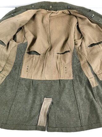 Feldbluse Modell 1940 für Mannschaften des Heeres. Kammerstück von 1941., stark getragen, Flickstellen. Ungereinigt