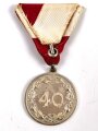 Österreich, Tragbare Medaille " Kameradschaftsbund Landesverband Oberösterreich 40 Jahre Mitglied " in Silber, an Dreiecksband