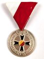 Österreich, Tragbare Verdienstmedaille in Silber " Kriegsopferverband Österreich " an Dreiecksband,  mit Kleberesten