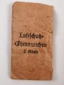 Luftschutz Ehrenzeichen 2. Stufe mit Verleihungstüte, Hersteller 60 im Bandring für " Katz & Deyle, Pforzheim ", Tüte teils eingerissen