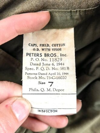 U.S. 1944 dated Field Cap Cotton, size 7.  Issued to British soldier. used, good conditon