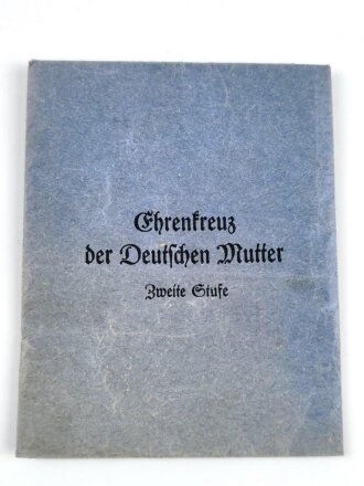 Ehrenkreuz der Deutschen Mutter (Mutterkreuz) in Silber am Band mit Verleihungstüte, Hersteller Deschler & Sohn, München, am rechten unteren Kreuzbereich mit Emailleschäden