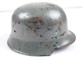 Feuerwehr III.Reich, Stahlhelmglocke. Nach dem Krieg übermalt, die originalen Abzeichen noch unter dem Lack