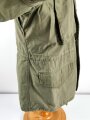 U.S.  M65 field jacket. Used, no label, size Medium. Insignia original sewn