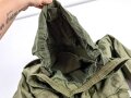 U.S.  M65 field jacket. Used, no label, size Medium. Insignia original sewn