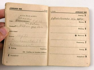 "Diensttaschenbuch des Nationalsozialistischen Fliegerkorps" Asugabe 1943, 128 Seiten, stark gebraucht, Einband vorne loße