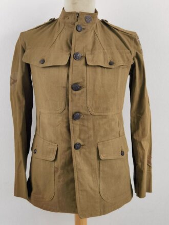 U.S. WWI AEF tunic, dated 1917. Soldier was a part of...