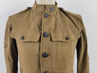 U.S. WWI AEF tunic, dated 1917. Soldier was a part of 80th Infantry Division , which saw heavy action in the Somme Offensive of 1918 and in the Meuse, Argonne area. Overseas twice.