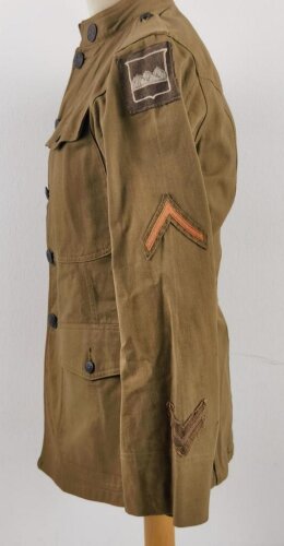 U.S. WWI AEF tunic, dated 1917. Soldier was a part of 80th Infantry Division , which saw heavy action in the Somme Offensive of 1918 and in the Meuse, Argonne area. Overseas twice.