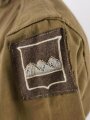 U.S. WWI AEF tunic, dated 1917. Soldier was a part of 80th Infantry Division , which saw heavy action in the Somme Offensive of 1918 and in the Meuse, Argonne area. Overseas twice.