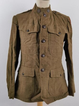 U.S. WWI AEF  tunic, soldier was member of the 27th Infantry Division, which had seen combat action in France, mainly  Meuse-Argonne (only the artillery), Ypres-Lys, Somme Offensive