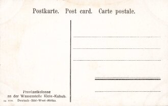 Postkarte, Deutsch Südwestafrika "Proviantkolonne an der Wasserstelle Klein-Kubub", in den Ecken Abdrücke aus Album