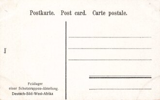 Postkarte, Deutsch Südwestafrika "Feldlager einer Schutztruppen-Abteilung", in den Ecken Abdrücke aus Album