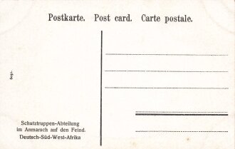 Postkarte, Deutsch Südwestafrika "Schutztruppen-Abteilung im Anmarsch auf den Feind", in den Ecken Abdrücke aus Album