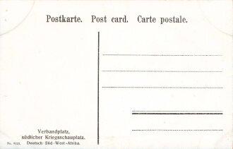 Postkarte, Deutsch Südwestafrika "Verbandplatz, südlicher Kriegsschauplatz", in den Ecken Abdrücke aus Album