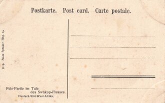 Postkarte, Deutsch Südwestafrika "Fels-Partie im Tale des Swakop-Flusses", in den Ecken Abdrücke aus Album