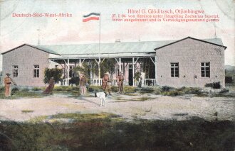 Postkarte, Deutsch Südwestafrika "Hotel O. Glöditzsch, Otjimbingwe", in den Ecken Abdrücke aus Album