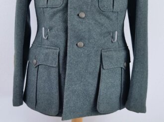 Feldbluse Modell 1936 für Mannschaften des Heeres. Kammerstück in sehr gutem Zustand, die Effekten original vernäht