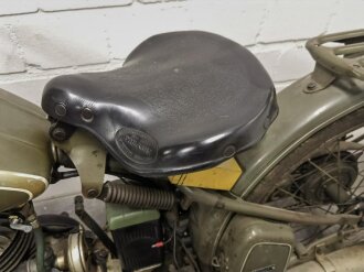 Steyr Daimler Puch AG, 125ccm Motorrad Baujahr 1941. Originale Wehrmachtslackierung, neuzeitlich lediglich der Komet am Schutzblech ergänzt.