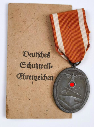 Deutsches Schutzwall Ehrenzeichen. Zink, in Tüte von Carl Poellath Schrobenhausen