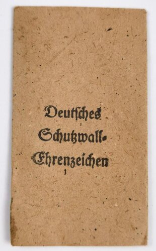 Deutsches Schutzwall Ehrenzeichen. Zink, in Tüte von Carl Poellath Schrobenhausen