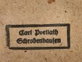 Deutsches Schutzwall Ehrenzeichen. Zink, in Tüte von Carl Poellath Schrobenhausen