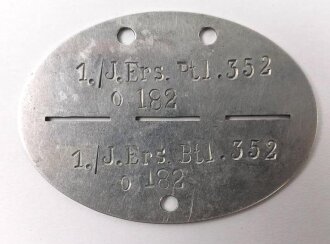 Erkennungsmarke Aluminium eines Angehörigen " 1/J.Ers.Btl.352 " 1. Infanterie Ersatz Bataillon 352