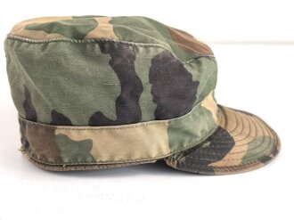 U.S. Army , 1981 dated Cap, Combat, woodland. Size 6 3/4,...