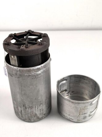 U.S. Army, WWII fuel stove. Container is 1944/ 1967...