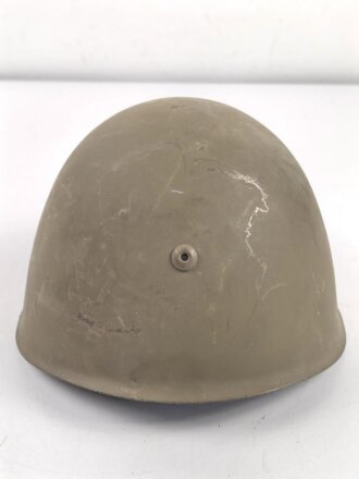 Italien, Stahlhelm Modell 1933. Originallack, wohl ungetragenes Stück, das Innenfutter mit Altersspuren