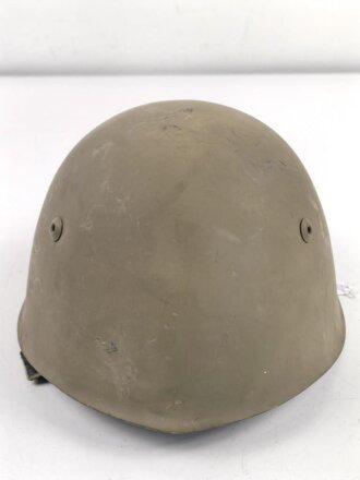 Italien, Stahlhelm Modell 1933. Originallack, wohl ungetragenes Stück, das Innenfutter mit Altersspuren